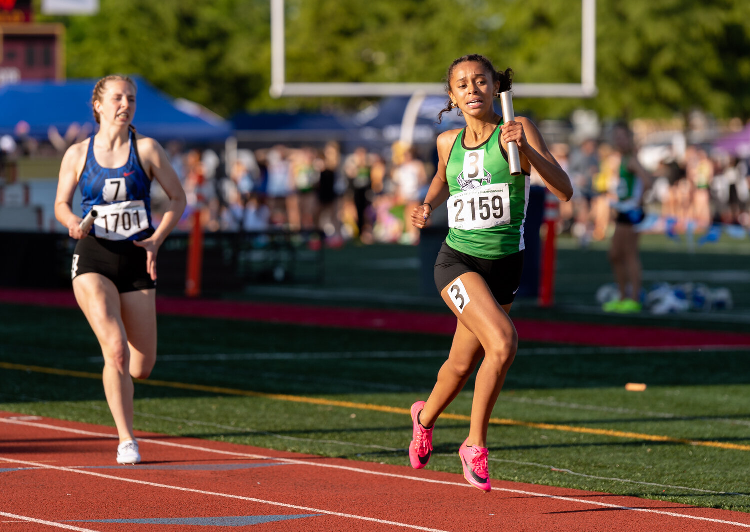 Tumwater’s Ava Jones breaks free from the pack to win the heat in the girls 4x400 preliminary relay at the WIAA 2A/3A/4A State Track and Field Championships on Thursday, May 25, 2023, at Mount Tahoma High School in Tacoma. (Joshua Hart/For The Chronicle)